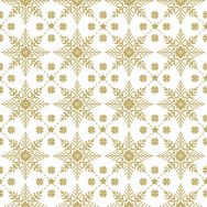 Servietten mit goldenen Schneemuster auf weißem Hintergrund